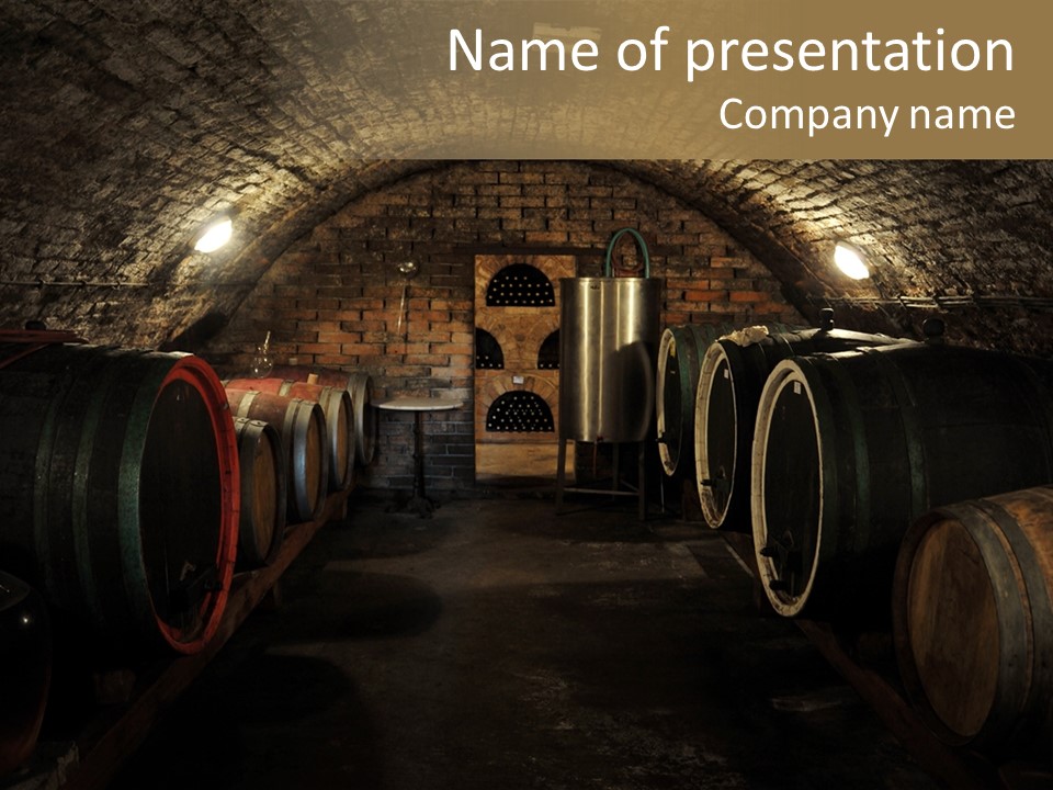 A Wine Cellar Filled With Lots Of Barrels PowerPoint Template