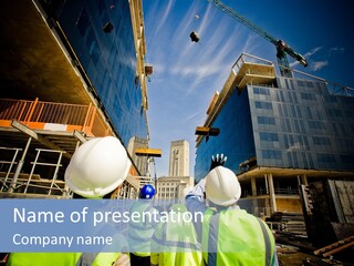 A Group Of Construction Workers Standing In Front Of A Building PowerPoint Template