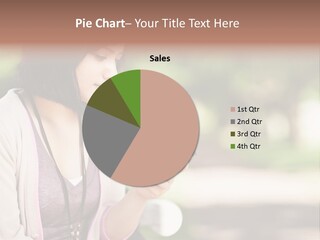 A Woman Is Looking At Her Cell Phone PowerPoint Template