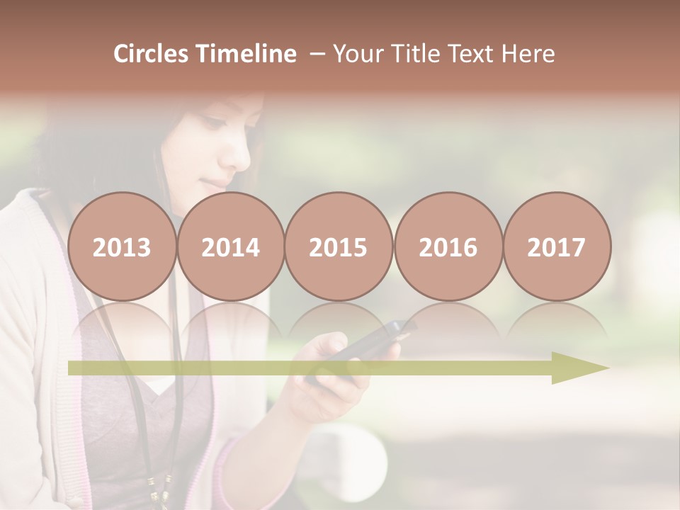 A Woman Is Looking At Her Cell Phone PowerPoint Template