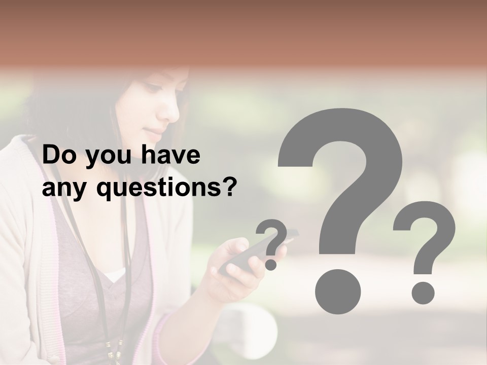 A Woman Is Looking At Her Cell Phone PowerPoint Template