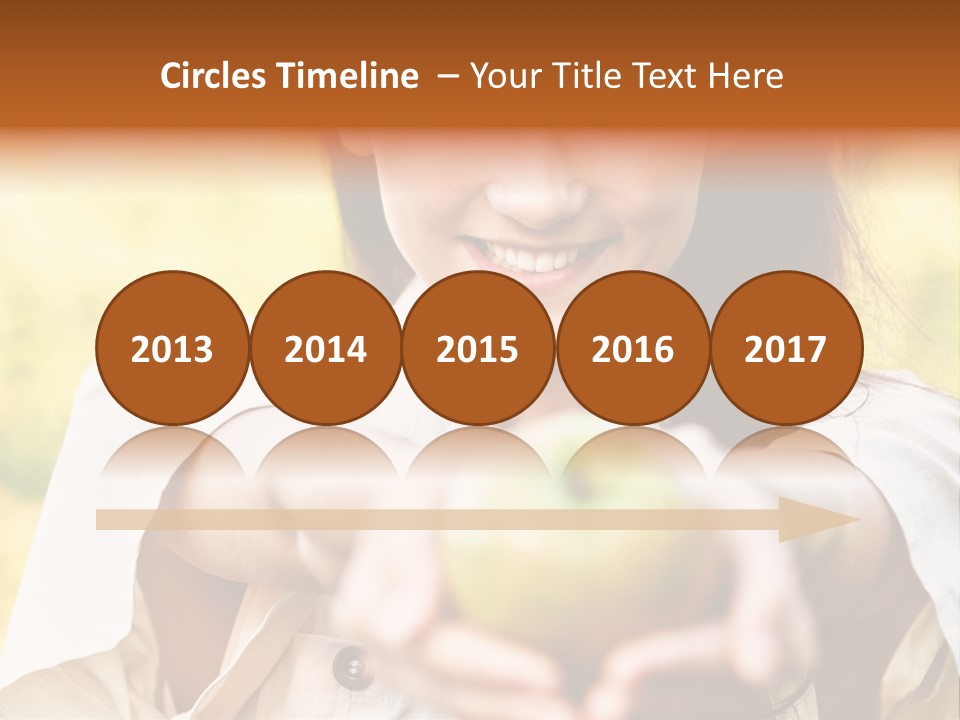 A Woman Holding A Green Apple In Her Hand PowerPoint Template