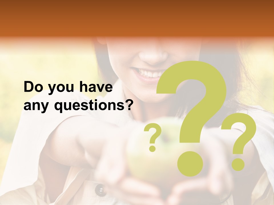 A Woman Holding A Green Apple In Her Hand PowerPoint Template