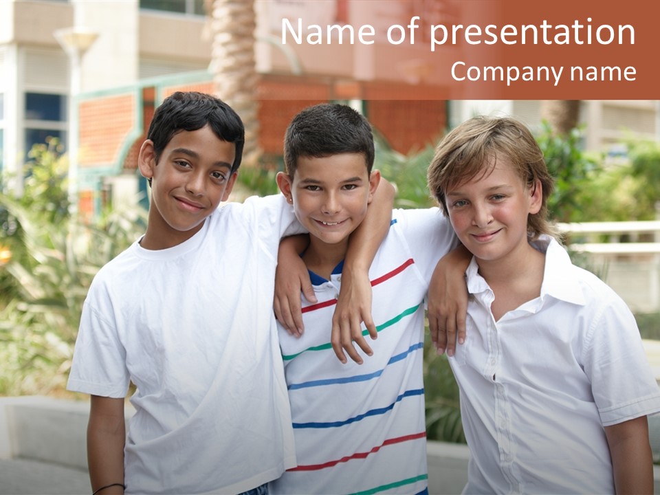 A Group Of Young Boys Standing Next To Each Other PowerPoint Template
