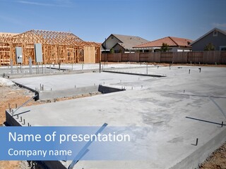 A House Being Built With A Lot Of Concrete PowerPoint Template