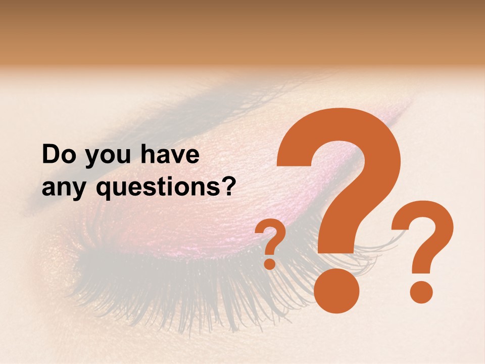 A Close Up Of A Woman's Eye With Pink And Yellow Makeup PowerPoint Template