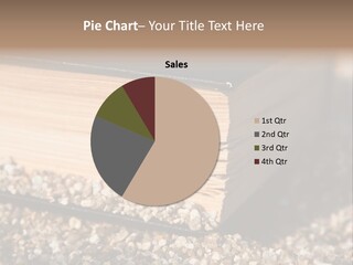 An Open Book On A Pile Of Gravel PowerPoint Template