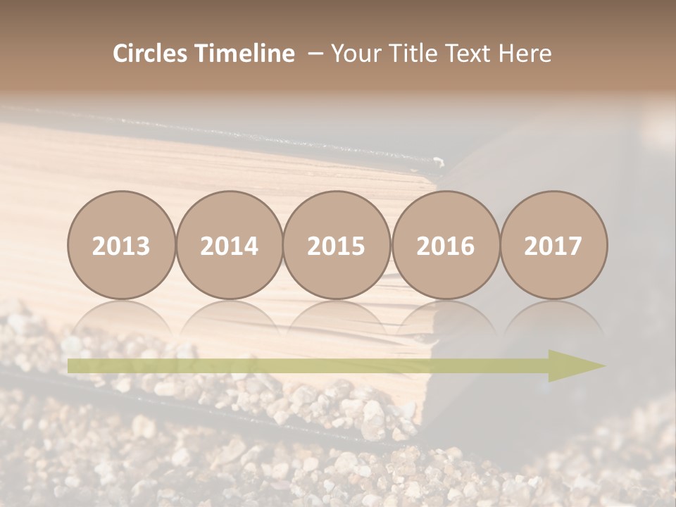 An Open Book On A Pile Of Gravel PowerPoint Template