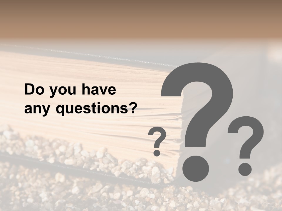 An Open Book On A Pile Of Gravel PowerPoint Template