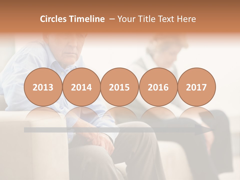 A Man Sitting On A Couch Next To A Woman PowerPoint Template