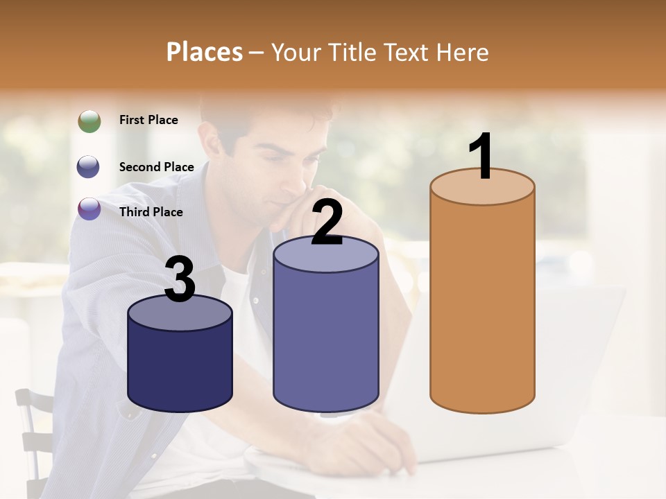 A Man Sitting In Front Of A Laptop Computer PowerPoint Template