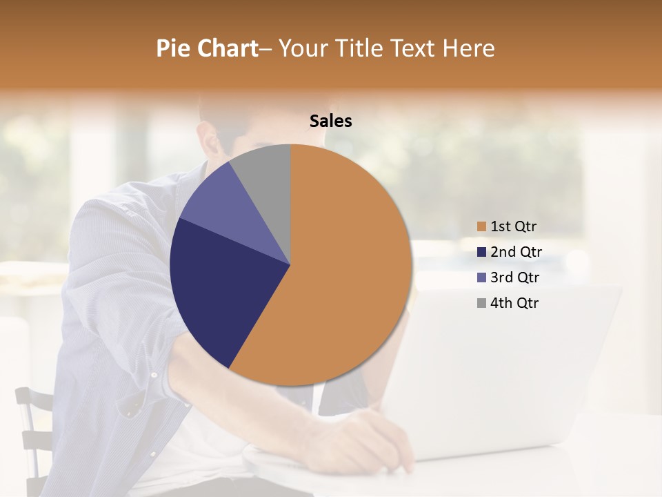 A Man Sitting In Front Of A Laptop Computer PowerPoint Template