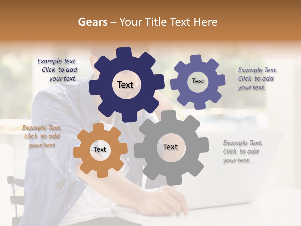 A Man Sitting In Front Of A Laptop Computer PowerPoint Template