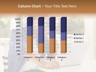 A Man Sitting In Front Of A Laptop Computer PowerPoint Template