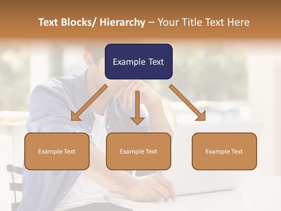 A Man Sitting In Front Of A Laptop Computer PowerPoint Template