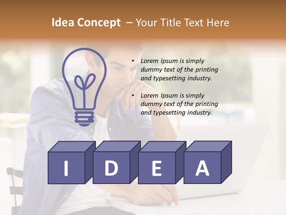 A Man Sitting In Front Of A Laptop Computer PowerPoint Template