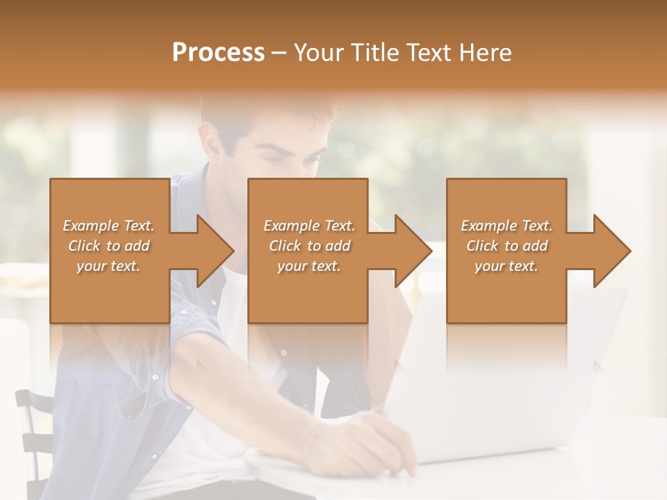 A Man Sitting In Front Of A Laptop Computer PowerPoint Template