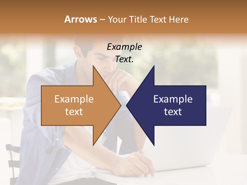 A Man Sitting In Front Of A Laptop Computer PowerPoint Template