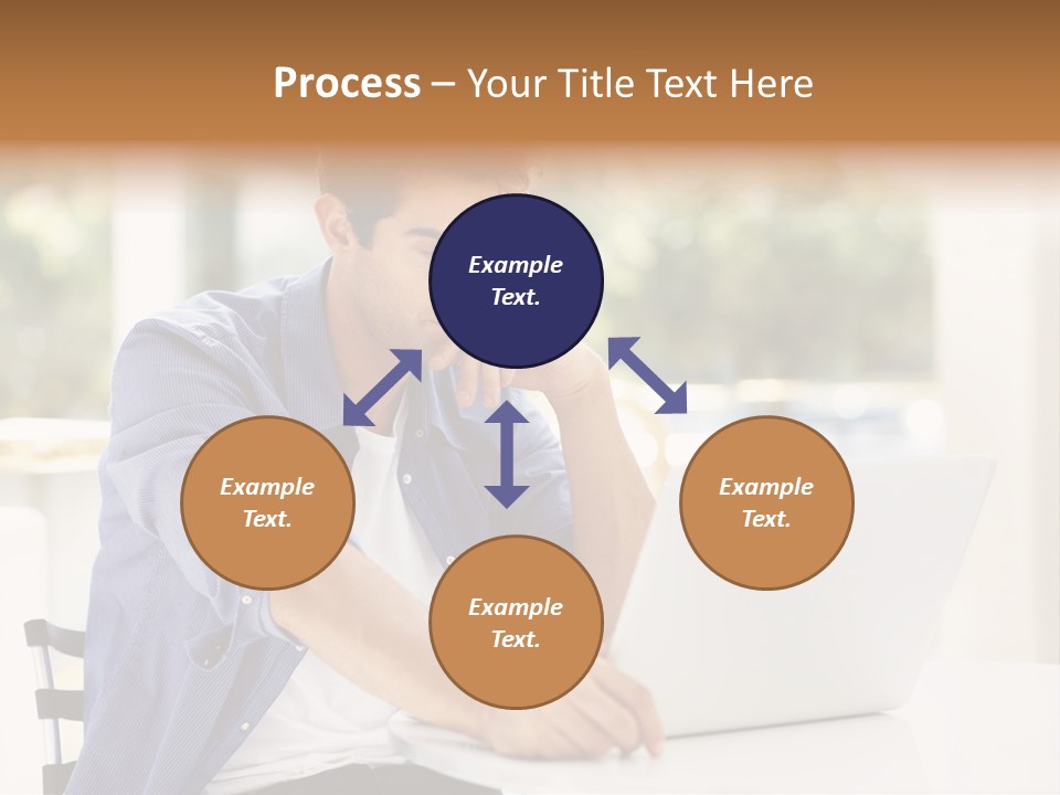 A Man Sitting In Front Of A Laptop Computer PowerPoint Template