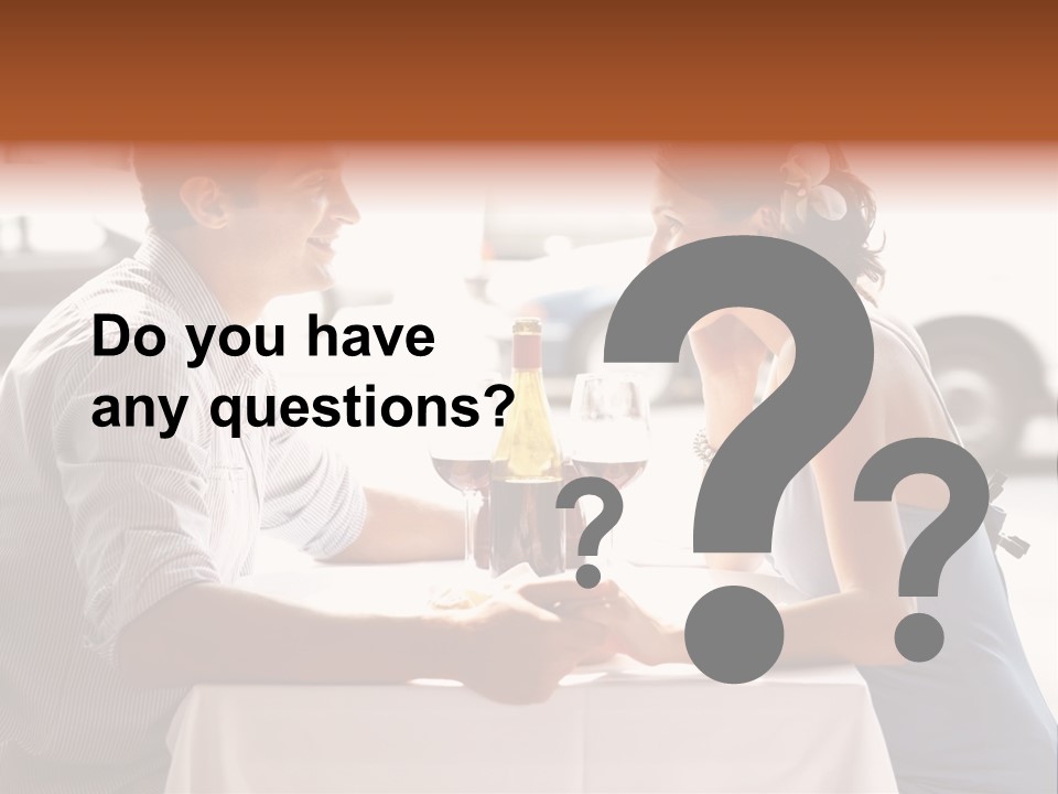 A Man And Woman Sitting At A Table With A Bottle Of Wine PowerPoint Template