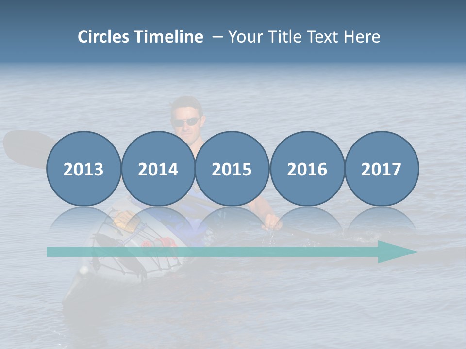 A Man Is Paddling A Kayak In The Water PowerPoint Template