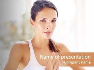 A Woman In A White Tank Top Holding Her Hands Together PowerPoint Template