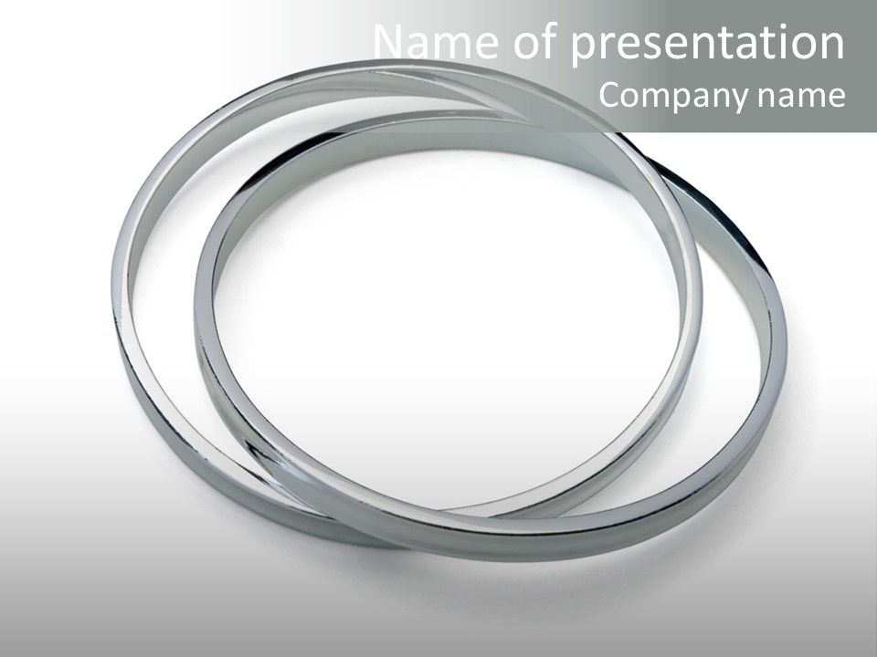 A Group Of Silver Rings On A White Background PowerPoint Template