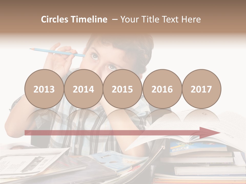 A Young Boy Is Sitting At A Desk With Books And A Pencil PowerPoint Template