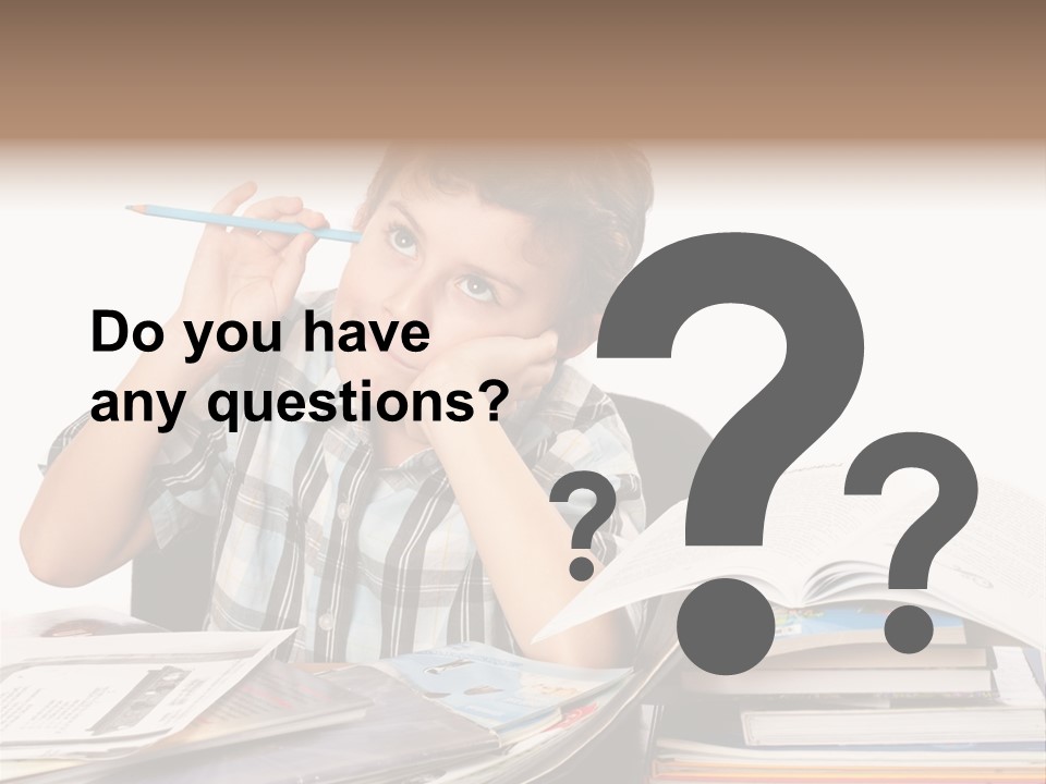 A Young Boy Is Sitting At A Desk With Books And A Pencil PowerPoint Template