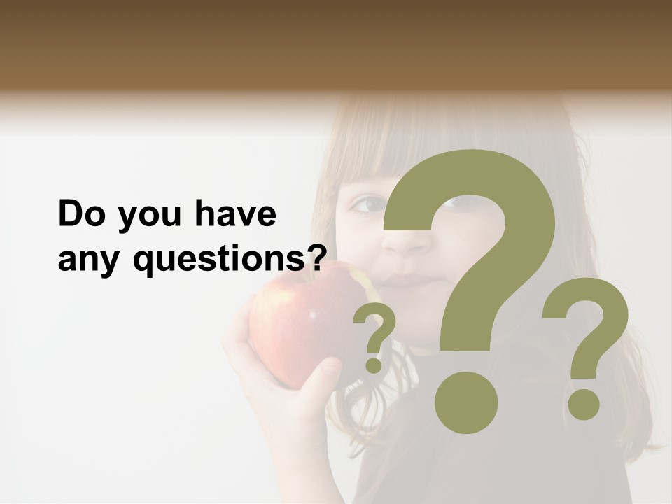 A Little Girl Holding An Apple In Her Hand PowerPoint Template