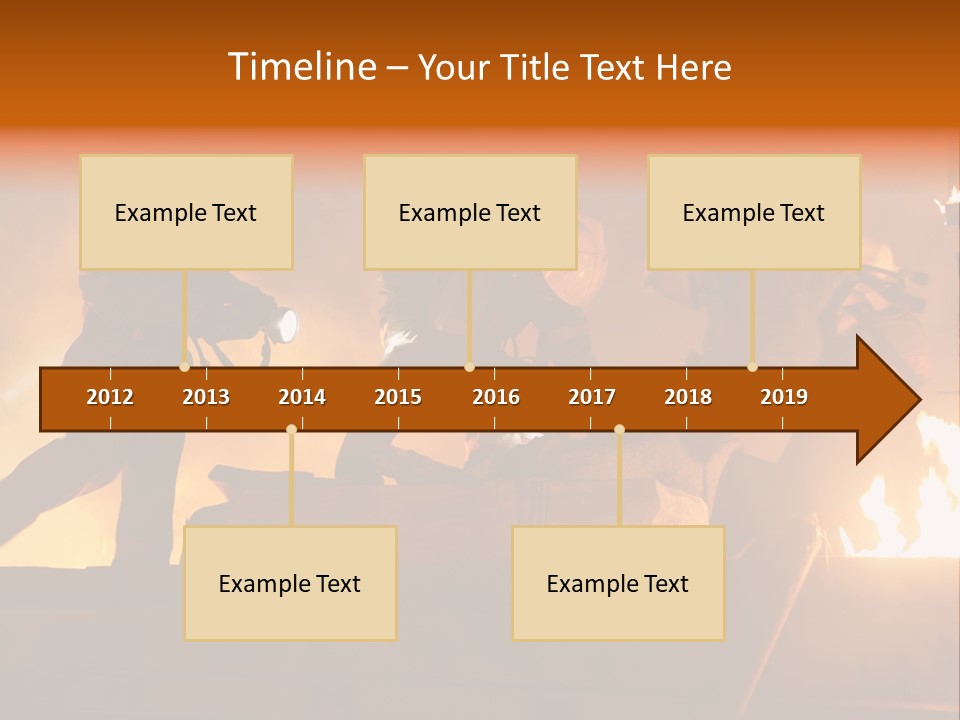A Group Of Fire Fighters Putting Out A Fire PowerPoint Template