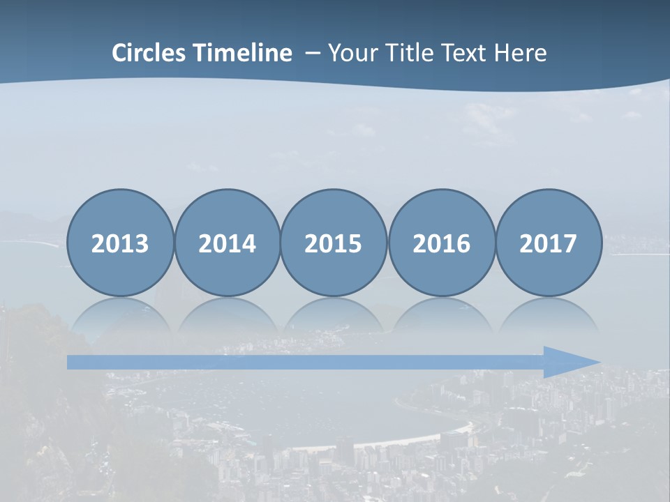 A Statue On Top Of A Mountain Overlooking A Body Of Water PowerPoint Template