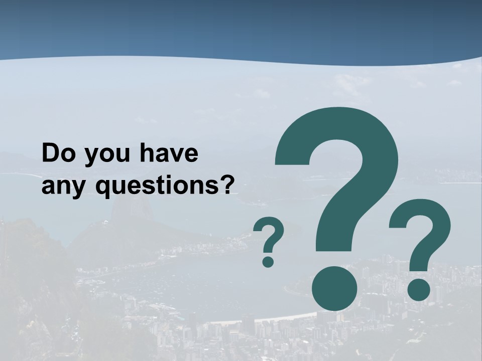 A Statue On Top Of A Mountain Overlooking A Body Of Water PowerPoint Template