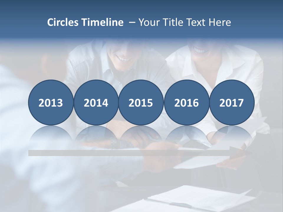 A Couple Of People Sitting At A Table PowerPoint Template