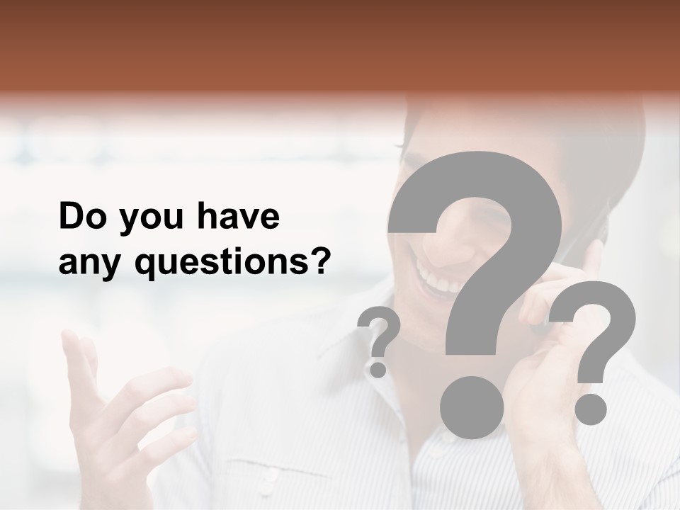 A Smiling Man Talking On A Cell Phone PowerPoint Template