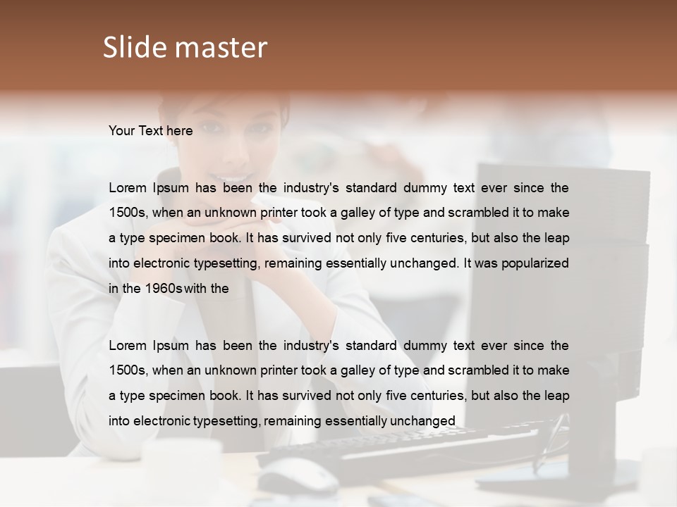 A Woman Sitting At A Desk In Front Of A Computer PowerPoint Template