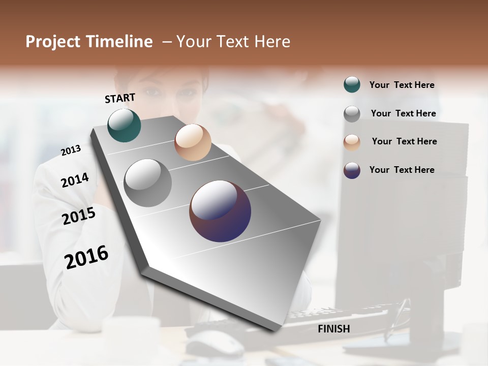 A Woman Sitting At A Desk In Front Of A Computer PowerPoint Template