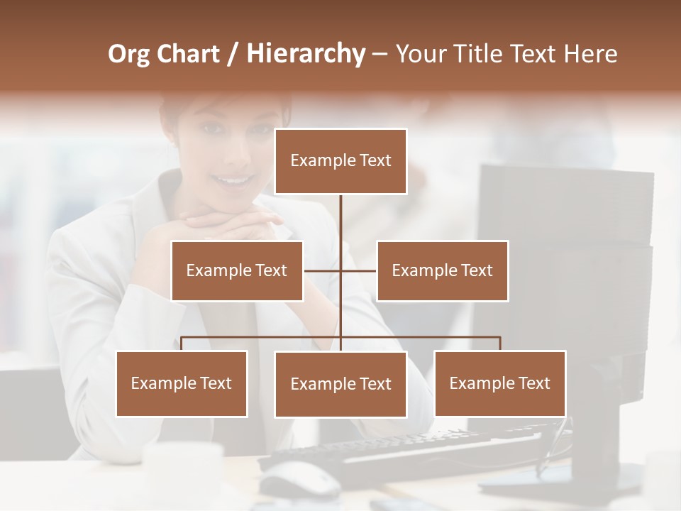 A Woman Sitting At A Desk In Front Of A Computer PowerPoint Template