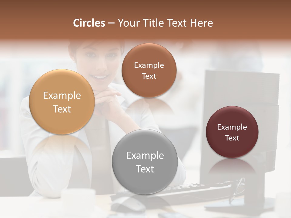 A Woman Sitting At A Desk In Front Of A Computer PowerPoint Template