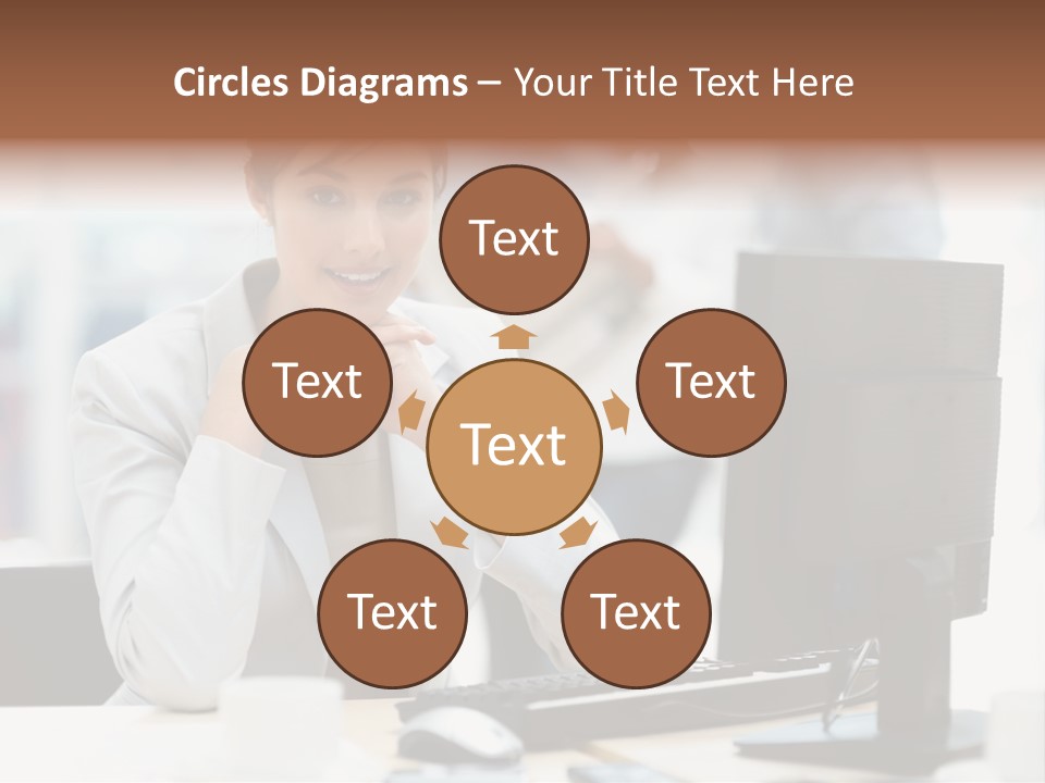 A Woman Sitting At A Desk In Front Of A Computer PowerPoint Template