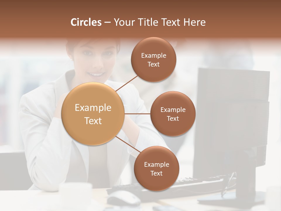 A Woman Sitting At A Desk In Front Of A Computer PowerPoint Template