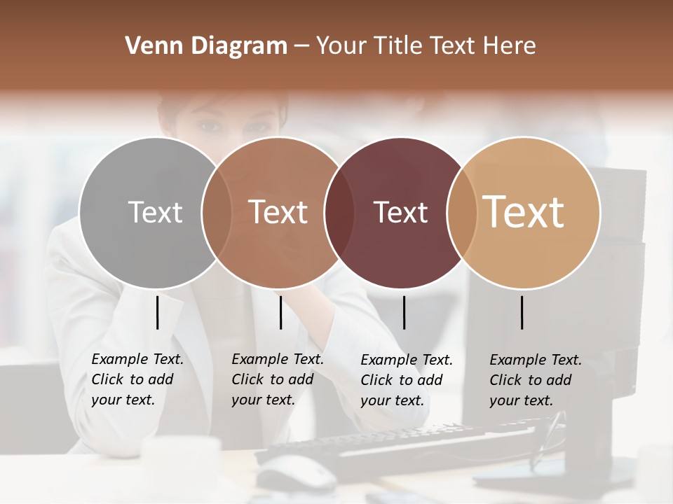A Woman Sitting At A Desk In Front Of A Computer PowerPoint Template