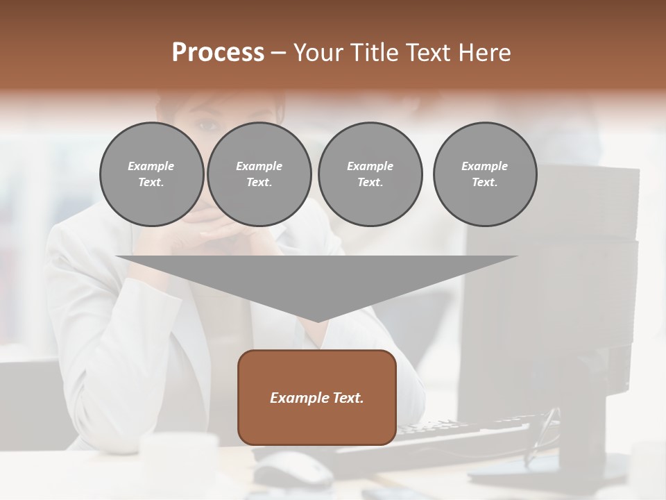 A Woman Sitting At A Desk In Front Of A Computer PowerPoint Template