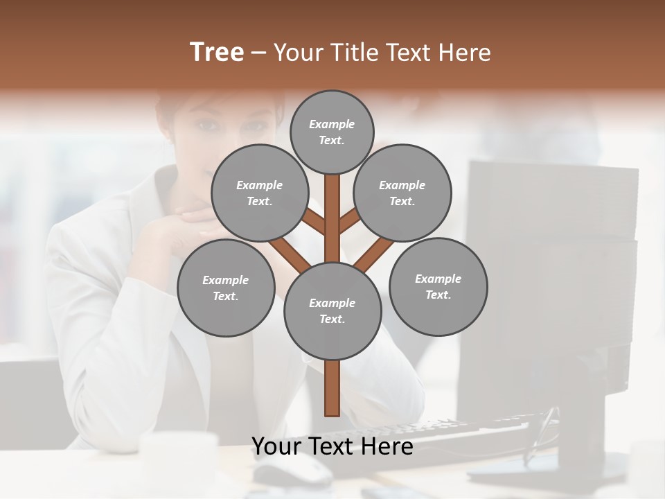 A Woman Sitting At A Desk In Front Of A Computer PowerPoint Template