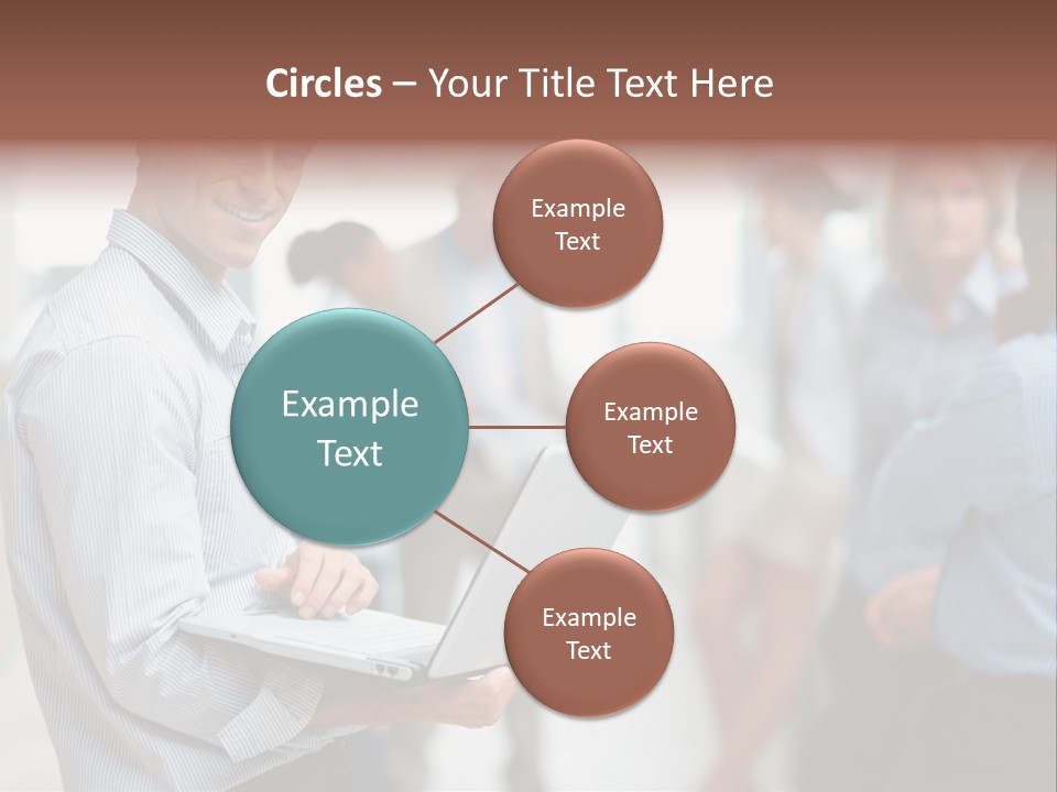 A Man Holding A Laptop In Front Of A Group Of People PowerPoint Template