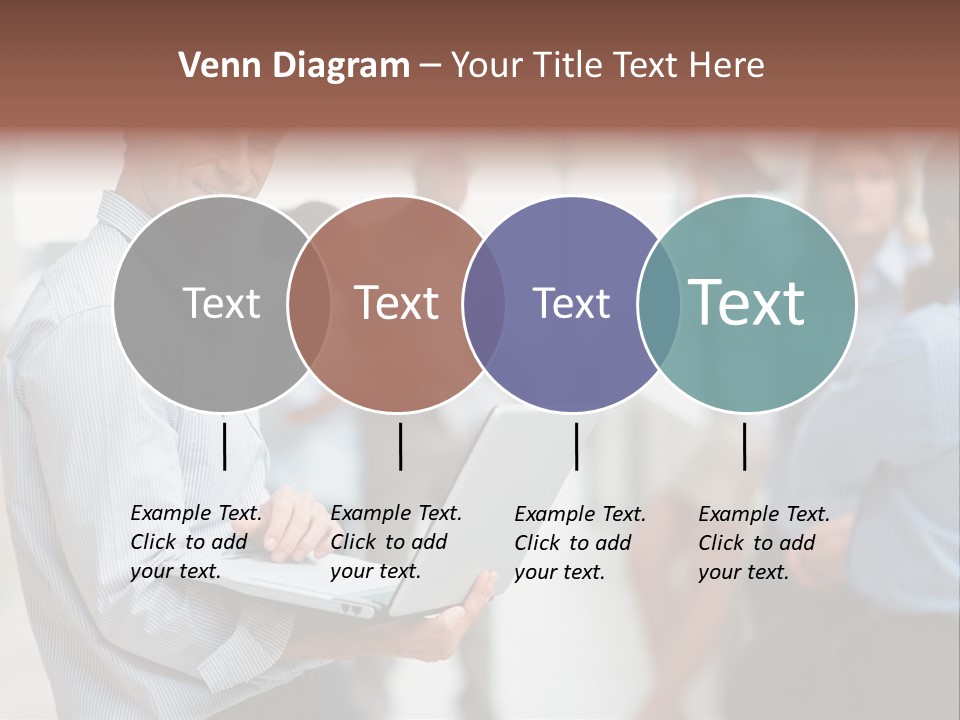 A Man Holding A Laptop In Front Of A Group Of People PowerPoint Template