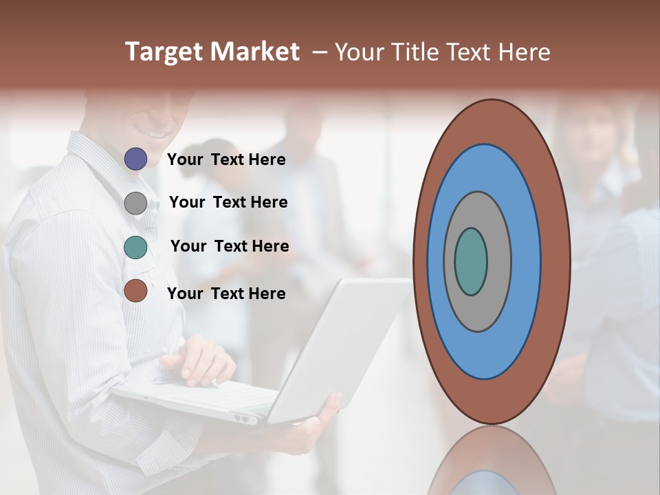 A Man Holding A Laptop In Front Of A Group Of People PowerPoint Template