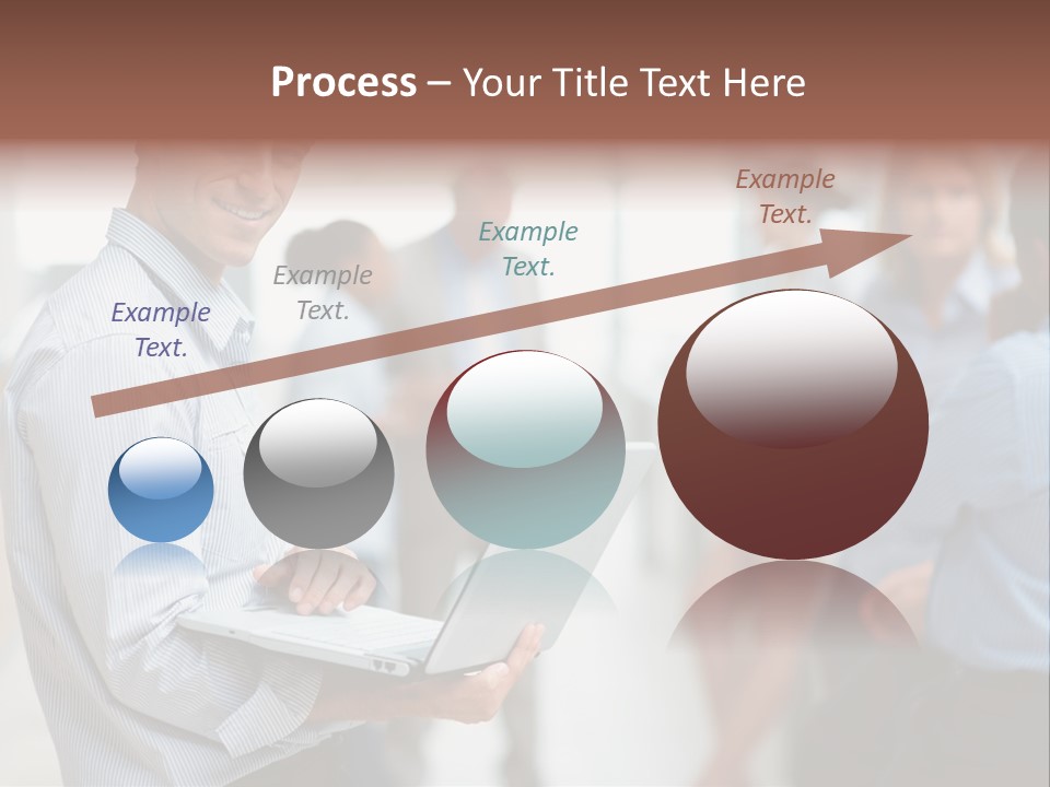A Man Holding A Laptop In Front Of A Group Of People PowerPoint Template