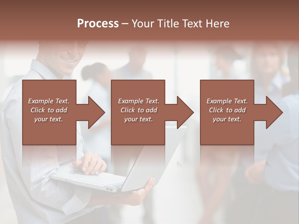 A Man Holding A Laptop In Front Of A Group Of People PowerPoint Template