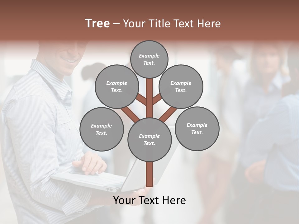 A Man Holding A Laptop In Front Of A Group Of People PowerPoint Template